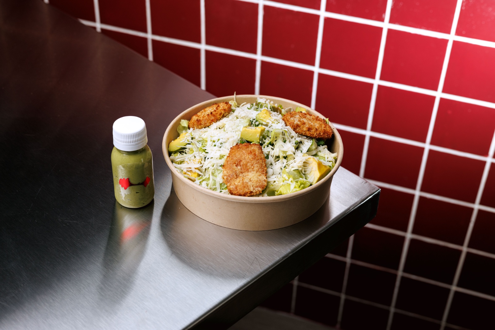 Crispy Green Goddess Salad — white cabbage, iceberg lettuce, spring onion, cucumber, avocado, crispy nuggets, green goddess dressing, parmesan