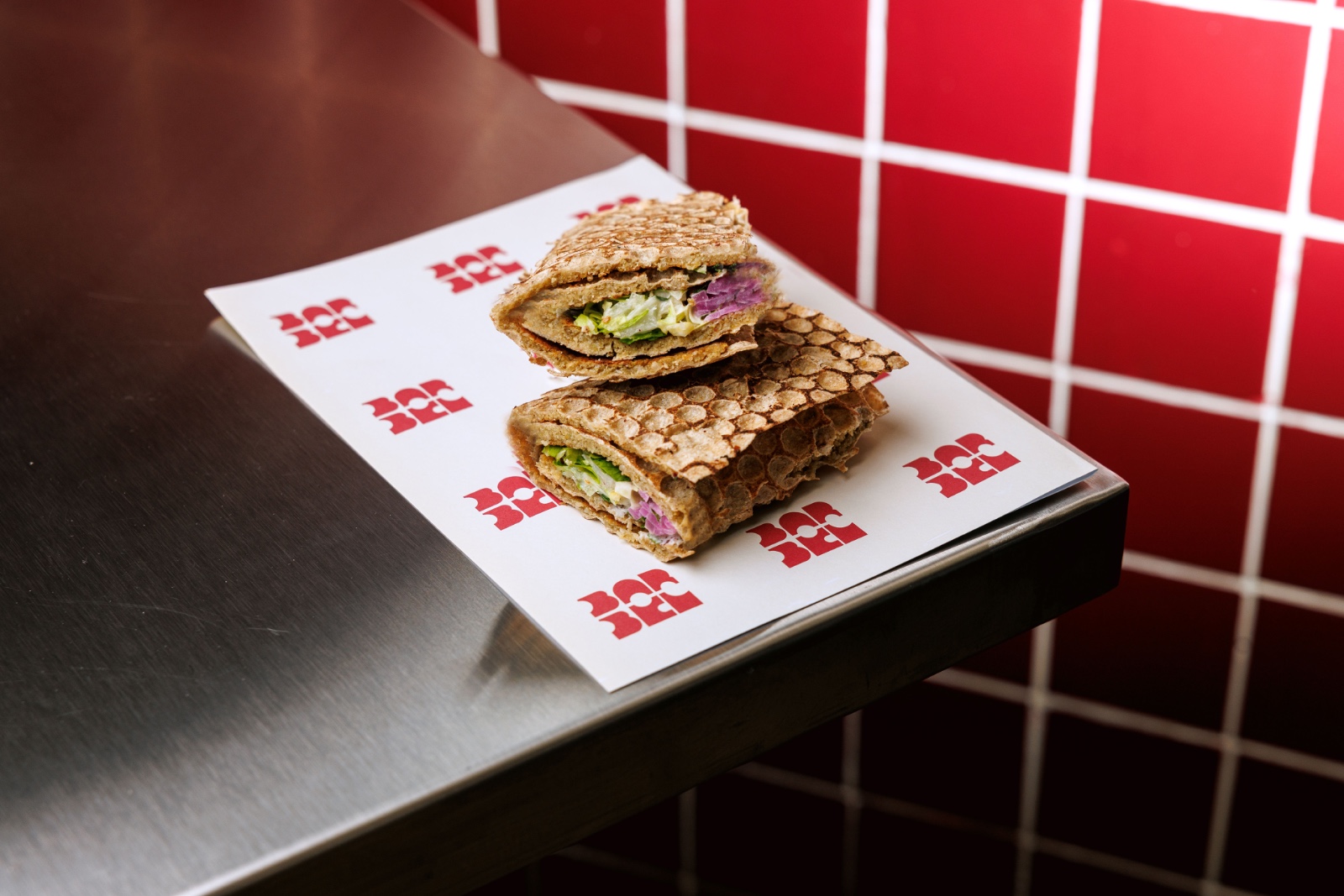 Shawarma Chimi Wrap — Shredded beef shawarma, romaine lettuce, pickled turnip, pickled onions, chimichurri, tahini sauce, sumac