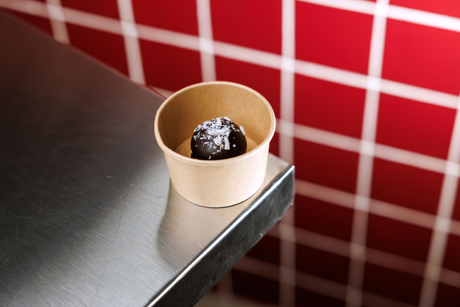 Bar Bel Date Protein Ball — almond flour , chocolate protein , dates , coconut , cocoa , honey , dipped in dark chocolate.